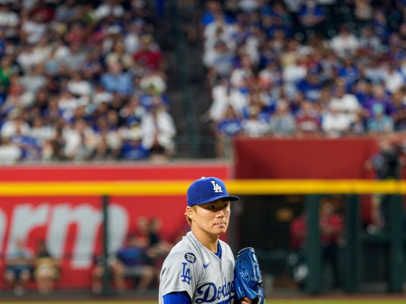 Sep 25, 2025; Phoenix, Arizona, USA; Los Angeles Dodgers starting pitcher Yoshinobu Yamamoto (18) on the mound pitching in the sixth inning against the Arizona Diamondbacks at Chase Field. Mandatory Credit: Allan Henry-Imagn Images