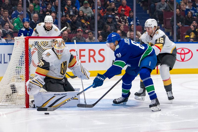 Apr 8, 2024; Vancouver, British Columbia, CAN; Vegas Golden Knights defenseman Noah Hanifin (15) watches as goalie Logan Thompson (36) makes a save on Vancouver Canucks forward Dakota Joshua (81) in the first period at Rogers Arena. Mandatory Credit: Bob Frid-USA TODAY Sports