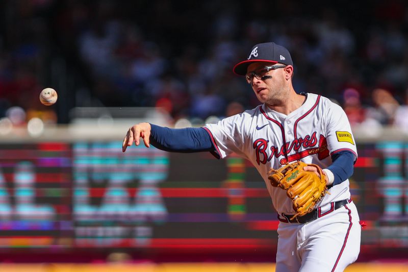 Sep 28, 2025; Cumberland, Georgia, USA; Atlanta Braves shortstop Nick Allen (2) throws the ball to first base for an out against the Pittsburgh Pirates during the third inning at Truist Park. Mandatory Credit: Jordan Godfree-Imagn Images