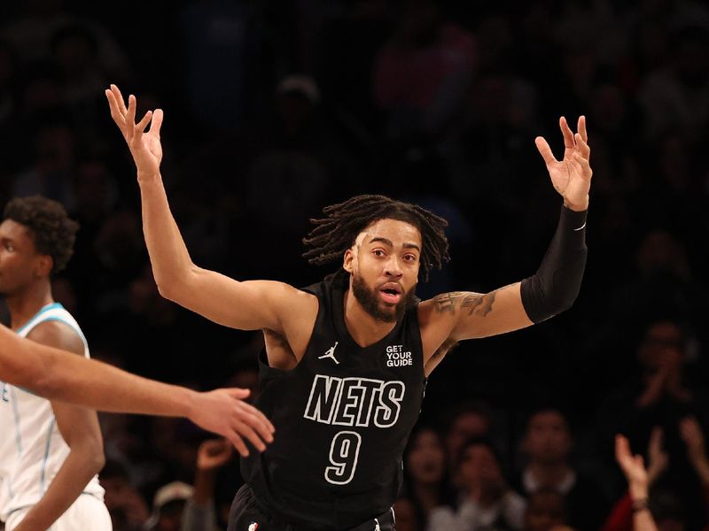 NEW YORK, NEW YORK - NOVEMBER 19:  Trendon Watford #9 of the Brooklyn Nets celebrates a basket late in the fourth quarter against the Charlotte Hornets during their game at Barclays Center on November 19, 2024 in New York City.   User expressly acknowledges and agrees that, by downloading and or using this photograph, User is consenting to the terms and conditions of the Getty Images License Agreement.  (Photo by Al Bello/Getty Images)