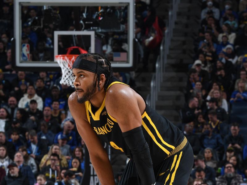 SAN FRANCISCO, CA - JANUARY 10:  Moses Moody #4 of the Golden State Warriors look on during the game on January 10, 2024 at Chase Center in San Francisco, California. NOTE TO USER: User expressly acknowledges and agrees that, by downloading and or using this photograph, user is consenting to the terms and conditions of Getty Images License Agreement. Mandatory Copyright Notice: Copyright 2024 NBAE (Photo by Noah Graham/NBAE via Getty Images)