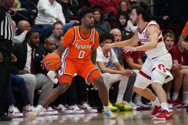 Jan 29, 2025; Stanford, California, USA;  Syracuse Orange guard Kyle Cuffe Jr. (0) dribbles against Stanford Cardinal guard Benny Gealer (5) during the first half at Maples Pavilion. Mandatory Credit: David Gonzales-Imagn Images