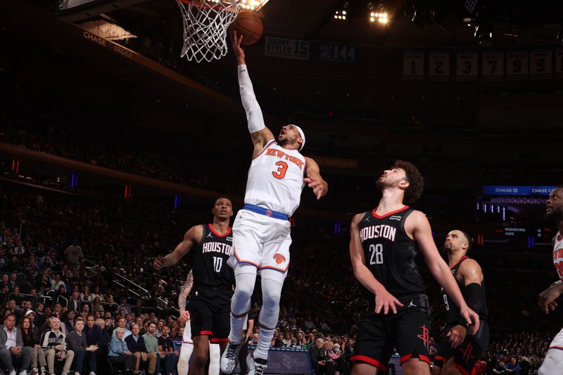 NEW YORK, NY - JANUARY 17: Josh Hart #3 of the New York Knicks drives to the basket during the game against the Houston Rockets on January 17, 2024 at Madison Square Garden in New York City, New York.  NOTE TO USER: User expressly acknowledges and agrees that, by downloading and or using this photograph, User is consenting to the terms and conditions of the Getty Images License Agreement. Mandatory Copyright Notice: Copyright 2024 NBAE  (Photo by Nathaniel S. Butler/NBAE via Getty Images)