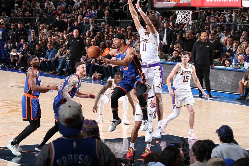 NEW YORK, NY - FEBRUARY 3: Josh Hart #3 of the New York Knicks passes the ball during the game against the Los Angeles Lakers on February 3, 2024 at Madison Square Garden in New York City, New York.  NOTE TO USER: User expressly acknowledges and agrees that, by downloading and or using this photograph, User is consenting to the terms and conditions of the Getty Images License Agreement. Mandatory Copyright Notice: Copyright 2024 NBAE  (Photo by Nathaniel S. Butler/NBAE via Getty Images)