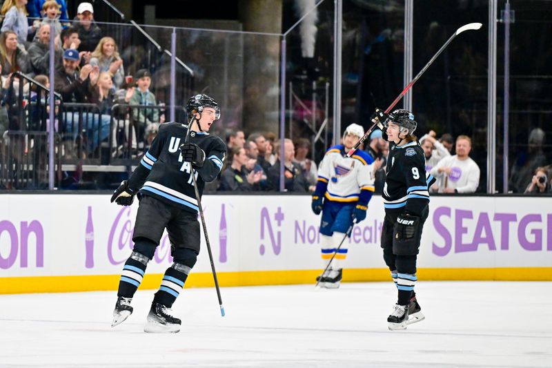 Jan 18, 2025; Salt Lake City, Utah, USA; Utah Hockey Club defenseman Michael Kesselring (7) reacts after scoring a goal against the St. Louis Blues during first period at the Delta Center. Mandatory Credit: Christopher Creveling-Imagn Images