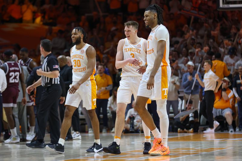 Feb 24, 2024; Knoxville, Tennessee, USA; Tennessee Volunteers guard Josiah-Jordan James (30) and guard Dalton Knecht (3) and forward Jonas Aidoo (0) during the second half against the Texas A&M Aggies at Thompson-Boling Arena at Food City Center. Mandatory Credit: Randy Sartin-USA TODAY Sports