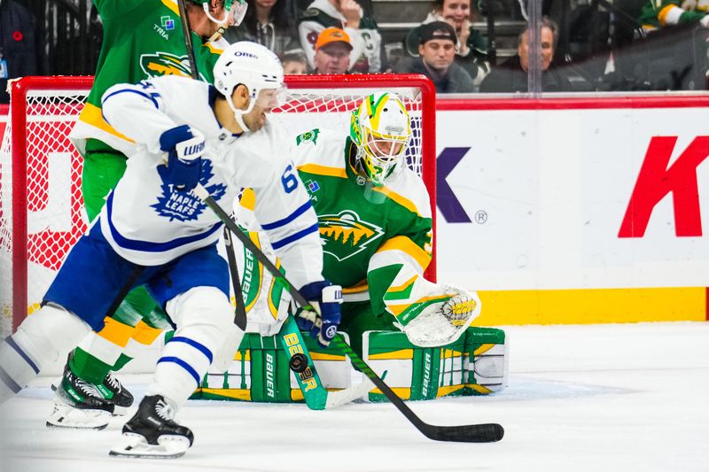 Nov 3, 2024; Saint Paul, Minnesota, USA; Minnesota Wild goaltender Filip Gustavsson (32) makes a save during the second period against the Toronto Maple Leafs at Xcel Energy Center. Mandatory Credit: Brace Hemmelgarn-Imagn Images