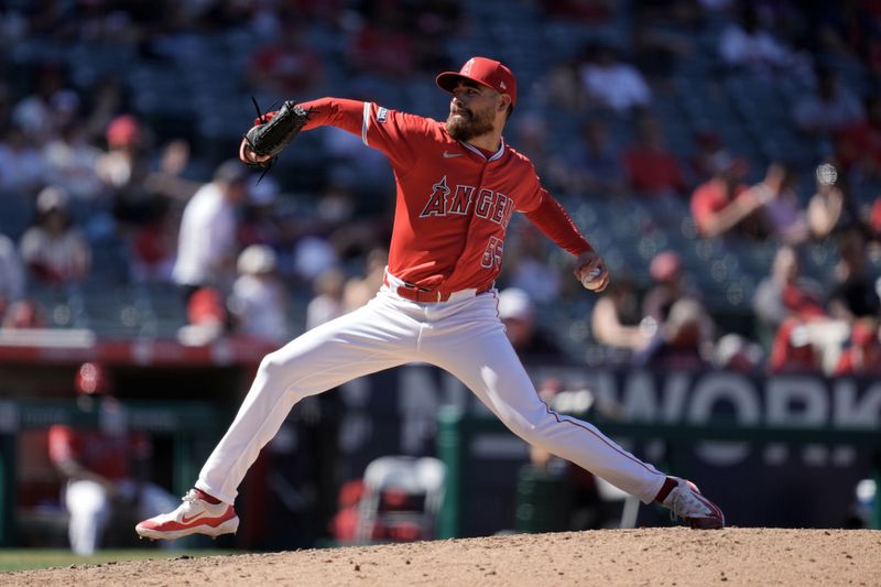 Apr 10, 2024; Anaheim, California, USA; Los Angeles Angels pitcher Matt Moore (55) throws in the eighth inning against the Tampa Bay Rays at Angel Stadium. Mandatory Credit: Kirby Lee-USA TODAY Sports