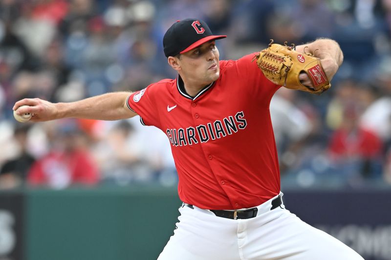 Jun 8, 2025; Cleveland, Ohio, USA; Cleveland Guardians relief pitcher Cade Smith (36) throws a pitch during the eighth inning against the Houston Astros at Progressive Field. Mandatory Credit: Ken Blaze-Imagn Images