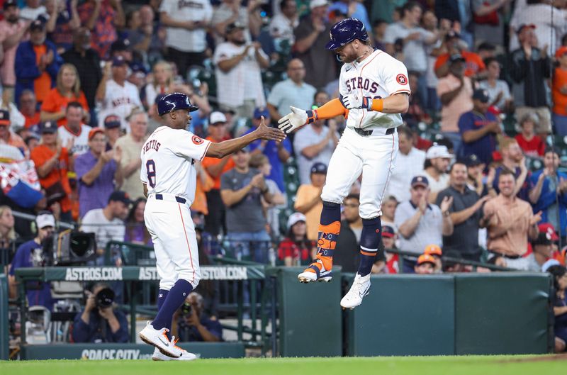 Jun 5, 2024; Houston, Texas, USA; Houston Astros right fielder Trey Cabbage (38) celebrates with third base coach Gary Pettis (8) after hitting a home run during the fifth inning against the St. Louis Cardinals at Minute Maid Park. Mandatory Credit: Troy Taormina-USA TODAY Sports