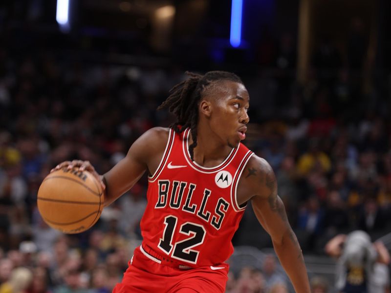 INDIANAPOLIS, IN - MARCH 13:  Ayo Dosunmu #12 of the Chicago Bulls handles the ball during the game  on March 13, 2024 at Gainbridge Fieldhouse in Indianapolis, Indiana. NOTE TO USER: User expressly acknowledges and agrees that, by downloading and or using this Photograph, user is consenting to the terms and conditions of the Getty Images License Agreement. Mandatory Copyright Notice: Copyright 2024 NBAE (Photo by Pepper Robinson/NBAE via Getty Images)