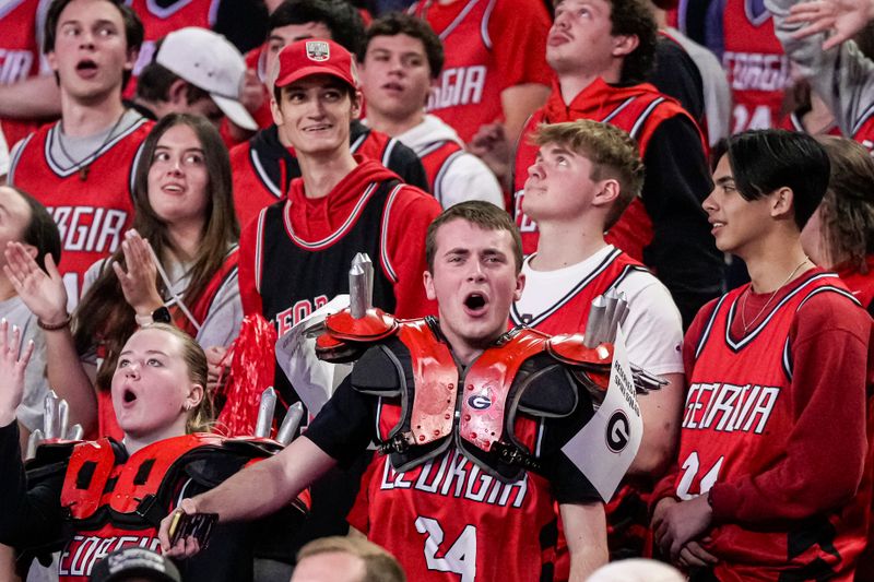 Feb 17, 2024; Athens, Georgia, USA; Georgia Bulldogs fans react during the game against the Florida Gators at Stegeman Coliseum. Mandatory Credit: Dale Zanine-USA TODAY Sports