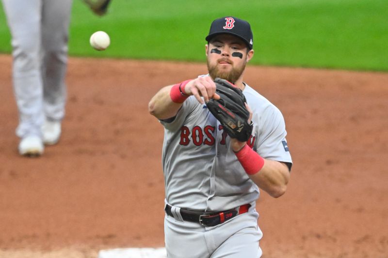 Jun 8, 2023; Cleveland, Ohio, USA; Boston Red Sox second baseman Christian Arroyo (39) throws to first base in the second inning against the Cleveland Guardians at Progressive Field. Mandatory Credit: David Richard-USA TODAY Sports