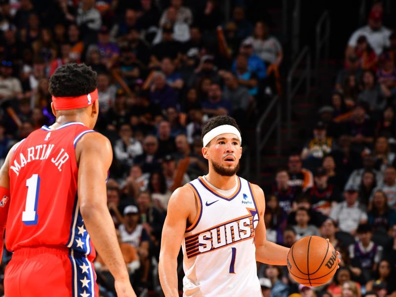 PHOENIX, AZ - MARCH 20: Devin Booker #1 of the Phoenix Suns handles the ball during the game against the Philadelphia 76ers on March 20, 2024 at Footprint Center in Phoenix, Arizona. NOTE TO USER: User expressly acknowledges and agrees that, by downloading and or using this photograph, user is consenting to the terms and conditions of the Getty Images License Agreement. Mandatory Copyright Notice: Copyright 2024 NBAE (Photo by Barry Gossage/NBAE via Getty Images)