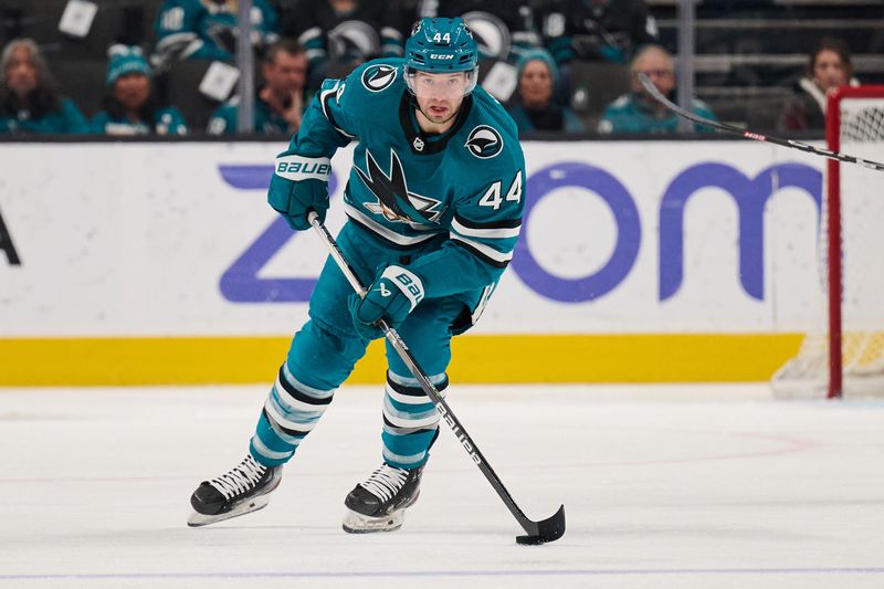 Apr 4, 2024; San Jose, California, USA; San Jose Sharks defenseman Marc-Edouard Vlasic (44) plays the puck against against the Los Angeles Kings during the second period at SAP Center at San Jose. Mandatory Credit: Robert Edwards-USA TODAY Sports