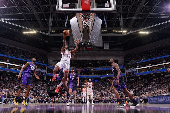 SACRAMENTO, CA - DECEMBER 22:  Saben Lee #38 of the Phoenix Suns goes to the basket during the game on December 22, 2023 at Golden 1 Center in Sacramento, California. NOTE TO USER: User expressly acknowledges and agrees that, by downloading and or using this Photograph, user is consenting to the terms and conditions of the Getty Images License Agreement. Mandatory Copyright Notice: Copyright 2023 NBAE (Photo by Rocky Widner/NBAE via Getty Images)