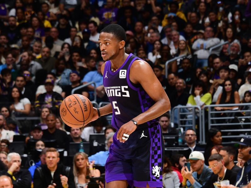 LOS ANGELES, CA - OCTOBER 26: De'Aaron Fox #5 of the Sacramento Kings dribbles the ball during the game against the Los Angeles Lakers on October 26, 2024 at Crypto.Com Arena in Los Angeles, California. NOTE TO USER: User expressly acknowledges and agrees that, by downloading and/or using this Photograph, user is consenting to the terms and conditions of the Getty Images License Agreement. Mandatory Copyright Notice: Copyright 2024 NBAE (Photo by Adam Pantozzi/NBAE via Getty Images)