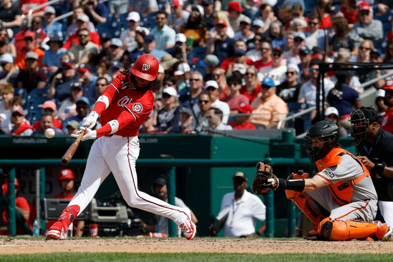 May 25, 2025; Washington, District of Columbia, USA; Washington Nationals shortstop CJ Abrams (5) doubles against the San Francisco Giants during the ninth inning at Nationals Park. Mandatory Credit: Geoff Burke-Imagn Images