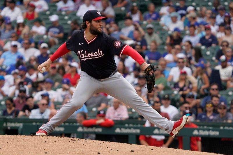 Sep 20, 2024; Chicago, Illinois, USA; Washington Nationals pitcher Trevor Williams throws the ball against the Chicago Cubs during the first inning at Wrigley Field. Mandatory Credit: David Banks-Imagn Images