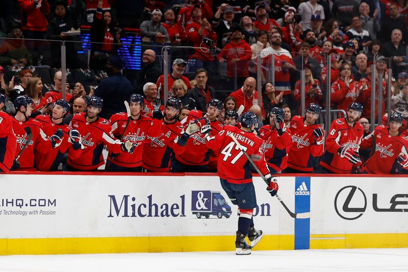 Feb 26, 2024; Washington, District of Columbia, USA; Washington Capitals left wing Beck Malenstyn (47) celebrates with teammates after scoring a goal against the Ottawa Senators in the first period at Capital One Arena. Mandatory Credit: Geoff Burke-USA TODAY Sports