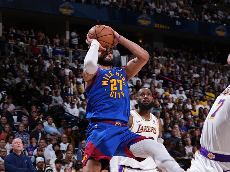 DENVER, CO - APRIL 20: Jamal Murray #27 of the Denver Nuggets shoots the ball during the game against the Los Angeles Lakers during Round 1 Game 1 of the 2024 NBA Playoffs on April 20, 2024 at the Ball Arena in Denver, Colorado. NOTE TO USER: User expressly acknowledges and agrees that, by downloading and/or using this Photograph, user is consenting to the terms and conditions of the Getty Images License Agreement. Mandatory Copyright Notice: Copyright 2024 NBAE (Photo by Garrett Ellwood/NBAE via Getty Images)