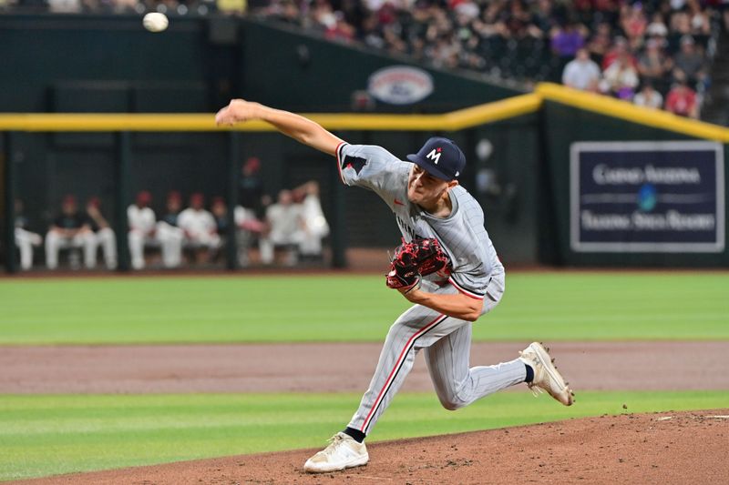Jun 27, 2024; Phoenix, Arizona, USA;  Minnesota Twins pitcher David Festa (58) throws in the first inning against the Arizona Diamondbacks at Chase Field. Mandatory Credit: Matt Kartozian-USA TODAY Sports