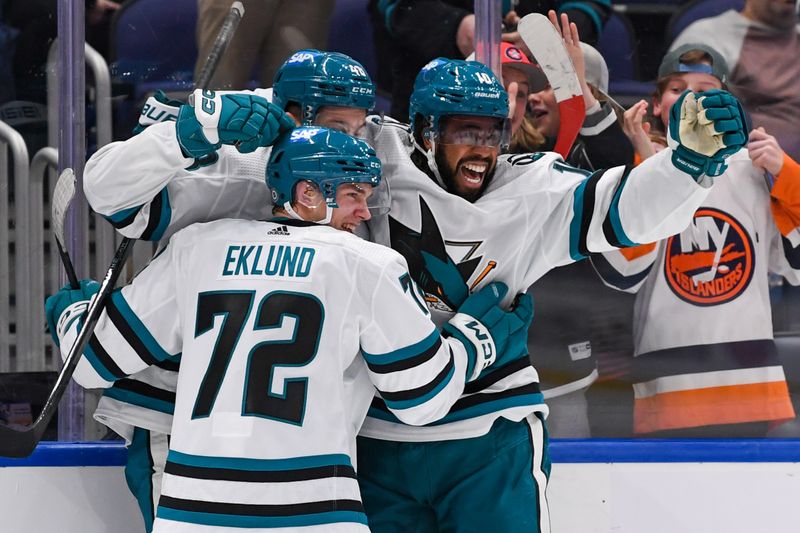 Dec 5, 2023; Elmont, New York, USA; San Jose Sharks left wing Anthony Duclair (10) and San Jose Sharks left wing William Eklund (72) celebrate the game tying goal by  San Jose Sharks center Tomas Hertl (48) against the New York Islanders during the third period at UBS Arena. Mandatory Credit: Dennis Schneidler-USA TODAY Sports