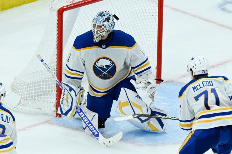 Oct 19, 2024; Chicago, Illinois, USA;  Buffalo Sabres goaltender Ukko-Pekka Luukkonen (1) defends against the Chicago Blackhawks during the third period at the United Center. Mandatory Credit: Matt Marton-Imagn Images