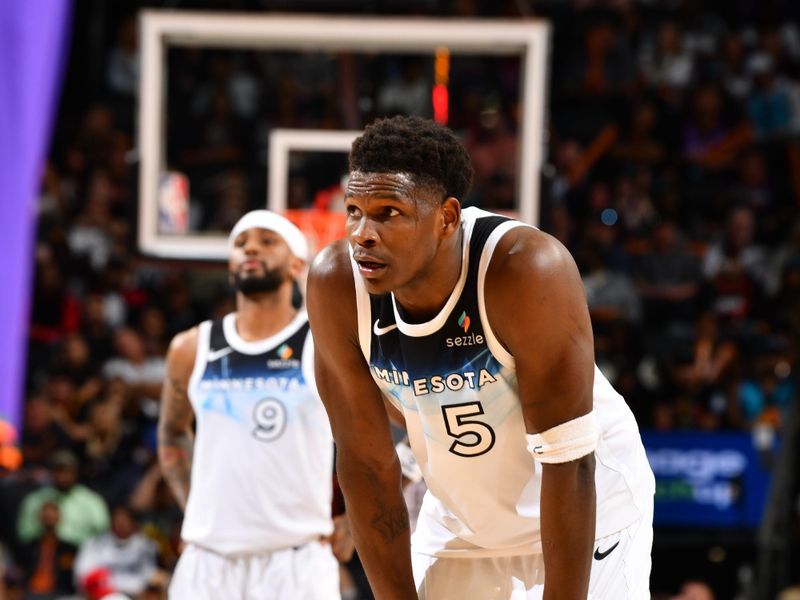 PHOENIX, AZ - MARCH 2: Anthony Edwards #5 of the Minnesota Timberwolves during the game against the Phoenix Suns   on March 2, 2025 at PHX Arena in Phoenix, Arizona. NOTE TO USER: User expressly acknowledges and agrees that, by downloading and or using this photograph, user is consenting to the terms and conditions of the Getty Images License Agreement. Mandatory Copyright Notice: Copyright 2025 NBAE (Photo by Barry Gossage/NBAE via Getty Images)