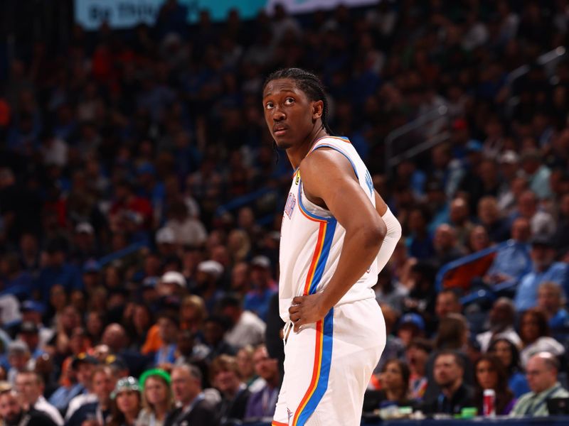 OKLAHOMA CITY, OK - MARCH 14: Jalen Williams #8 of the Oklahoma City Thunder looks on during the game against the Dallas Mavericks on March 13, 2024 at Paycom Arena in Oklahoma City, Oklahoma. NOTE TO USER: User expressly acknowledges and agrees that, by downloading and or using this photograph, User is consenting to the terms and conditions of the Getty Images License Agreement. Mandatory Copyright Notice: Copyright 2024 NBAE (Photo by Zach Beeker/NBAE via Getty Images)