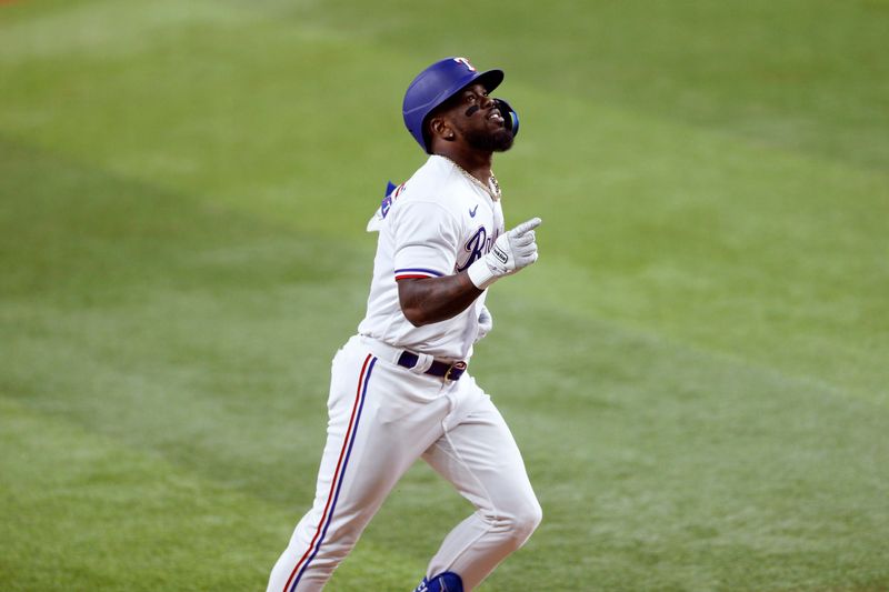 Oct 10, 2023; Arlington, Texas, USA; Texas Rangers right fielder Adolis Garcia (53) celebrates after hitting a three run home run in the second inning against the Baltimore Orioles during game three of the ALDS for the 2023 MLB playoffs at Globe Life Field. Mandatory Credit: Andrew Dieb-USA TODAY Sports