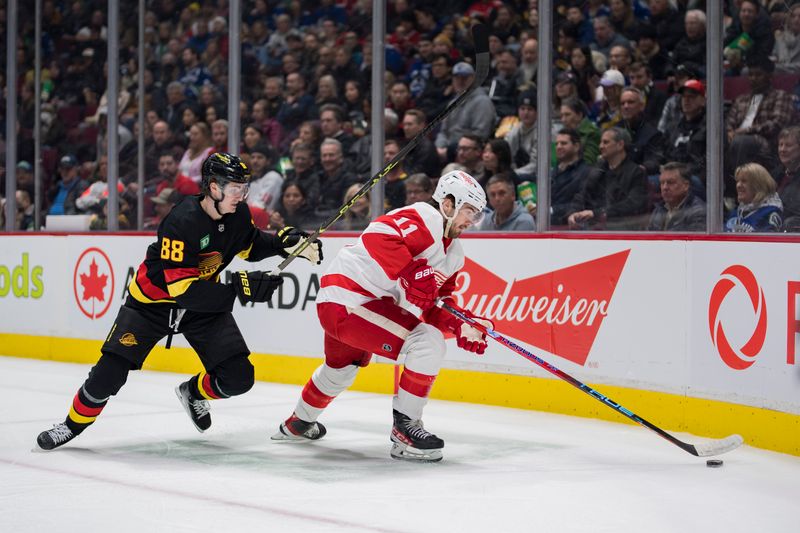 Feb 13, 2023; Vancouver, British Columbia, CAN; Vancouver Canucks forward Nils Aman (88) skates after Detroit Red Wings forward Filip Zadina (11) in the second period at Rogers Arena. Mandatory Credit: Bob Frid-USA TODAY Sports