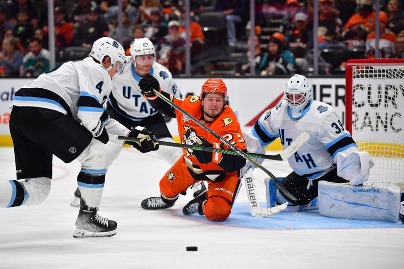 Oct 16, 2024; Anaheim, California, USA; Anaheim Ducks center Mason McTavish (23) moves in for a shot against Utah Hockey Club goaltender Connor Ingram (39) during the second period at Honda Center. Mandatory Credit: Gary A. Vasquez-Imagn Images