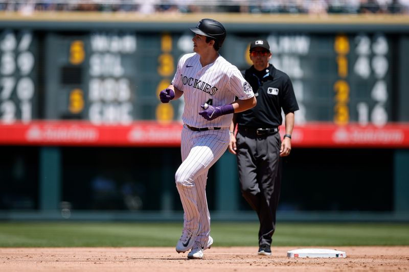 Jul 16, 2023; Denver, Colorado, USA; Colorado Rockies first baseman Michael Toglia (4) rounds the bases on a solo home run in the second inning against the New York Yankees at Coors Field. Mandatory Credit: Isaiah J. Downing-USA TODAY Sports