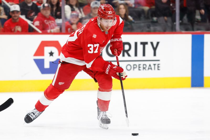 Dec 23, 2025; Detroit, Michigan, USA;  Detroit Red Wings left wing J.T. Compher (37) skates with the puck in the second period against the Dallas Stars at Little Caesars Arena. Mandatory Credit: Rick Osentoski-Imagn Images