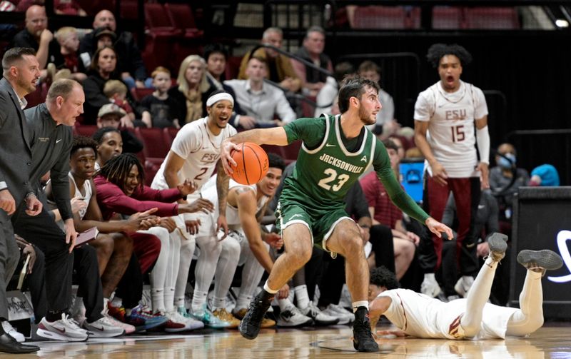 Dec 22, 2025; Tallahassee, Florida, USA; Jacksonville University Dolphins forward Enrico Borio (23) drives to the hoop during the first half against the Florida State Seminoles at Donald L. Tucker Center. Mandatory Credit: Melina Myers-Imagn Images
