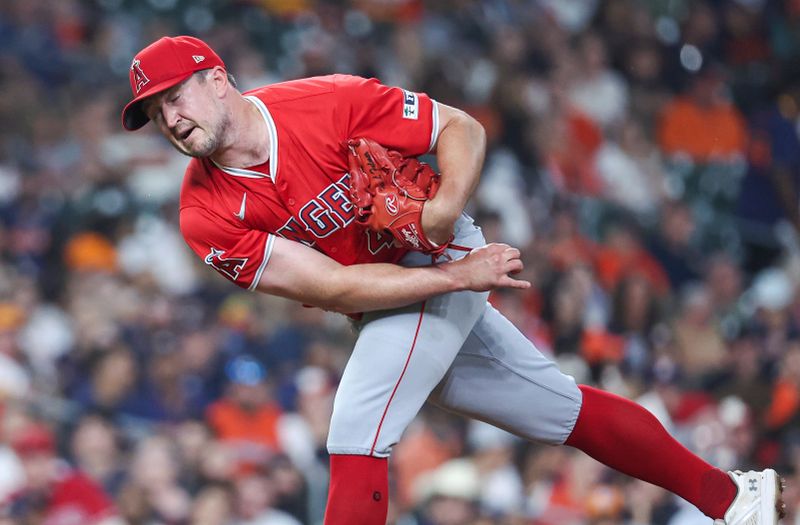 May 21, 2024; Houston, Texas, USA; Los Angeles Angels relief pitcher Carson Fulmer (41) delivers a pitch during the sixth inning against the Houston Astros at Minute Maid Park. Mandatory Credit: Troy Taormina-USA TODAY Sports