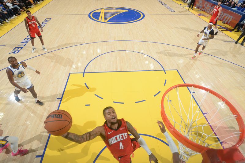 SAN FRANCISCO, CA - DECEMBER 5: Jalen Green #4 of the Houston Rockets drives to the basket during the game against the Golden State Warriors on December 5, 2024 at Chase Center in San Francisco, California. NOTE TO USER: User expressly acknowledges and agrees that, by downloading and or using this photograph, user is consenting to the terms and conditions of Getty Images License Agreement. Mandatory Copyright Notice: Copyright 2024 NBAE (Photo by Noah Graham/NBAE via Getty Images)