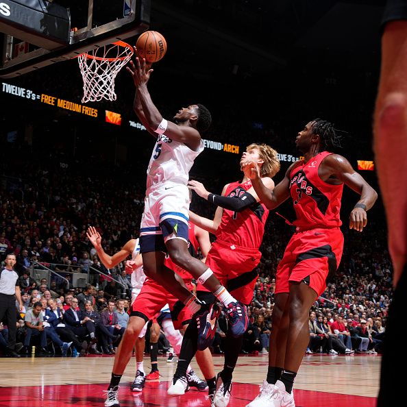 TORONTO, CANADA - OCTOBER 25: Anthony Edwards #5 of the Minnesota Timberwolves drives to the basket during the game against the Toronto Raptors on October 25, 2023 at the Scotiabank Arena in Toronto, Ontario, Canada.  NOTE TO USER: User expressly acknowledges and agrees that, by downloading and or using this Photograph, user is consenting to the terms and conditions of the Getty Images License Agreement.  Mandatory Copyright Notice: Copyright 2023 NBAE (Photo by Mark Blinch/NBAE via Getty Images)