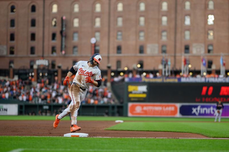 Jun 26, 2024; Baltimore, Maryland, USA; Baltimore Orioles shortstop Gunnar Henderson (2) rounds third base after hitting a home run during the fifth inning against the Cleveland Guardians at Oriole Park at Camden Yards. Mandatory Credit: Reggie Hildred-USA TODAY Sports