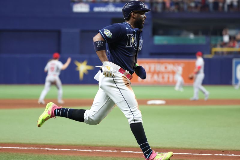 Aug 8, 2023; St. Petersburg, Florida, USA; Tampa Bay Rays first baseman Yandy Diaz (2) scores a run against the St. Louis Cardinals ]during the eighth inning  at Tropicana Field. Mandatory Credit: Kim Klement Neitzel-USA TODAY Sports