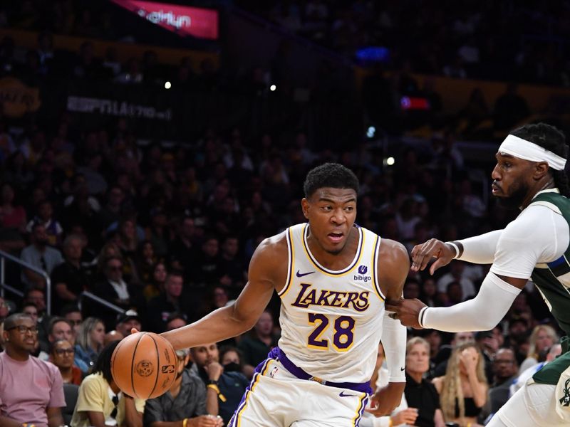 LOS ANGELES, CA - OCTOBER 15: Rui Hachimura #28 of the Los Angeles Lakers drives to the basket during the preseason game on October 15, 2023 at Crypto.Com Arena in Los Angeles, California. NOTE TO USER: User expressly acknowledges and agrees that, by downloading and/or using this Photograph, user is consenting to the terms and conditions of the Getty Images License Agreement. Mandatory Copyright Notice: Copyright 2023 NBAE (Photo by Juan Ocampo/NBAE via Getty Images)