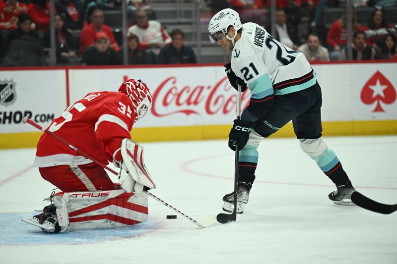 Oct 24, 2023; Detroit, Michigan, USA; Detroit Red Wings goaltender Ville Husso (35) stops a shot by Seattle Kraken center Alex Wennberg (21) in the first period at Little Caesars Arena. Mandatory Credit: Lon Horwedel-USA TODAY Sports