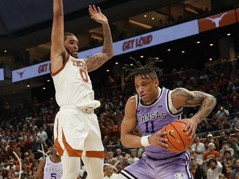 Jan 3, 2023; Austin, Texas, USA; Kansas State Wildcats forward Keyontae Johnson (11) drives to the basket against Texas Longhorns forward Timmy Allen (0) during the second half at Moody Center. Mandatory Credit: Scott Wachter-USA TODAY Sports