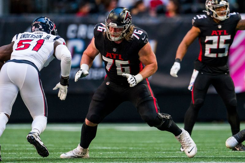 Atlanta Falcons offensive tackle Kaleb McGary (76) works during the first half of an NFL football game against the Houston Texans, Sunday, Oct. 8, 2023, in Atlanta. The Atlanta Falcons won 21-19. (AP Photo/Danny Karnik)