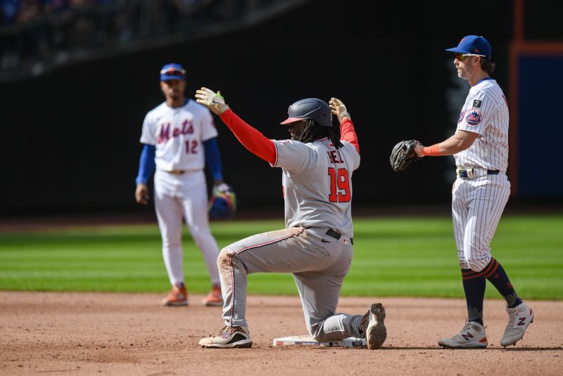 Sep 21, 2025; New York City, New York, USA; Washington Nationals first baseman Josh Bell (19) reacts after hitting a double against the New York Mets during the sixth inning at Citi Field. Mandatory Credit: John Jones-Imagn Images