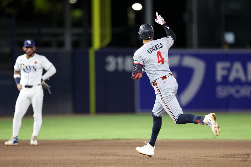 May 26, 2025; Tampa, Florida, USA; Minnesota Twins shortstop Carlos Correa (4) runs the bases after hitting a two run home run against the Tampa Bay Rays in the seventh inning at George M. Steinbrenner Field. Mandatory Credit: Nathan Ray Seebeck-Imagn Images