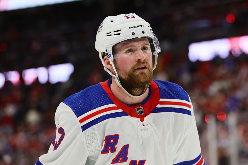 May 26, 2024; Sunrise, Florida, USA; New York Rangers left wing Alexis Lafrenière (13) looks on against the Florida Panthers during the second period in game three of the Eastern Conference Final of the 2024 Stanley Cup Playoffs at Amerant Bank Arena. Mandatory Credit: Sam Navarro-USA TODAY Sports