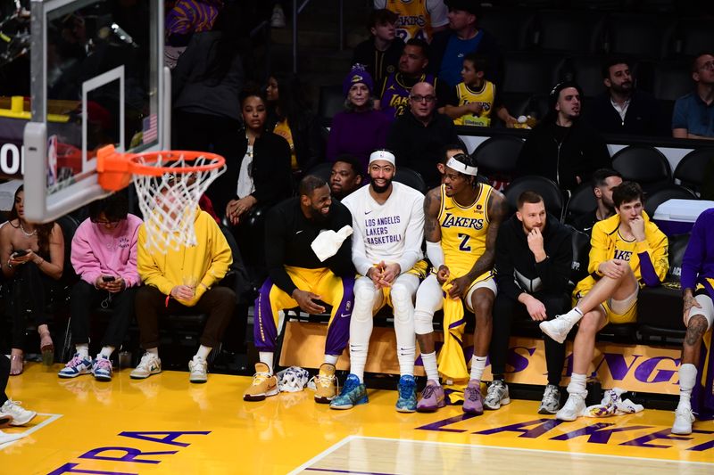 LOS ANGELES, CA - JANUARY 17: The Los Angeles Lakers bench laughs during the game against the Dallas Mavericks on January 17, 2024 at Crypto.Com Arena in Los Angeles, California. NOTE TO USER: User expressly acknowledges and agrees that, by downloading and/or using this Photograph, user is consenting to the terms and conditions of the Getty Images License Agreement. Mandatory Copyright Notice: Copyright 2024 NBAE (Photo by Adam Pantozzi/NBAE via Getty Images)