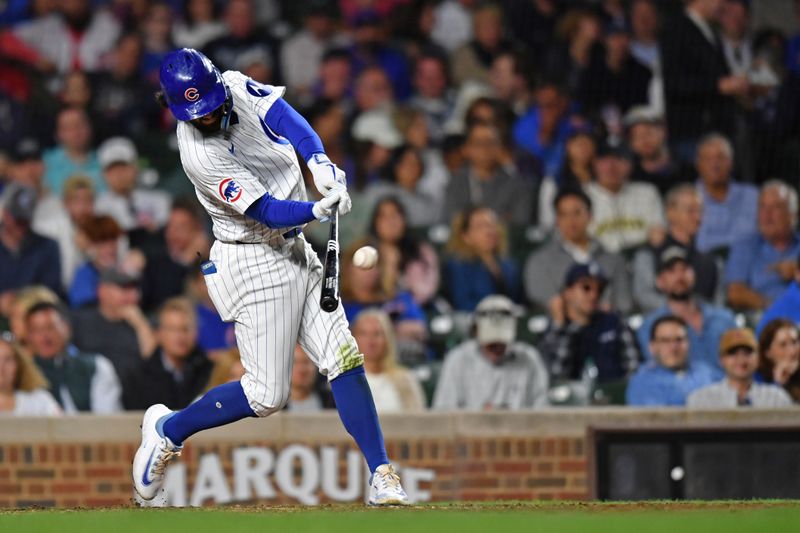 Aug 20, 2024; Chicago, Illinois, USA; Chicago Cubs shortstop Dansby Swanson (7) hits a home run during the sixth inning against the Detroit Tigers at Wrigley Field. Mandatory Credit: Patrick Gorski-USA TODAY Sports